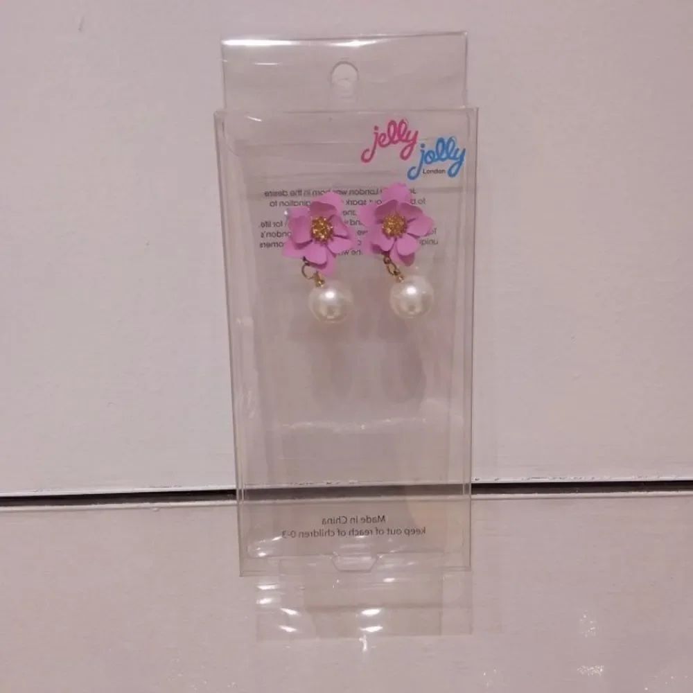 Pink flower pearl drop earrings